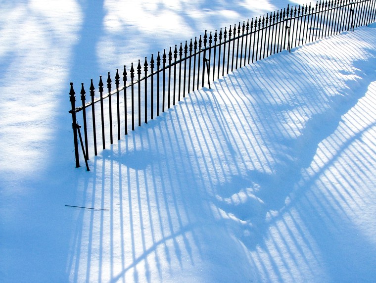 Fence Shadows On Snow