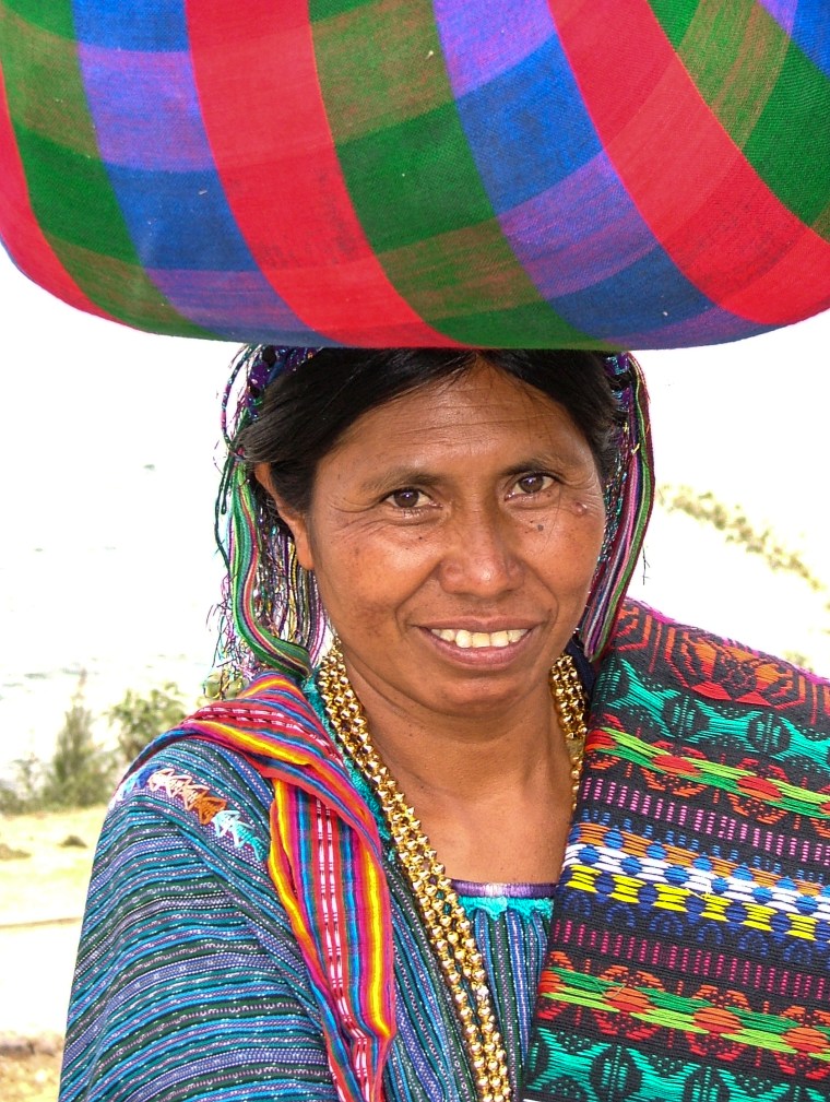 Woman Carrying Bundle On Her Head